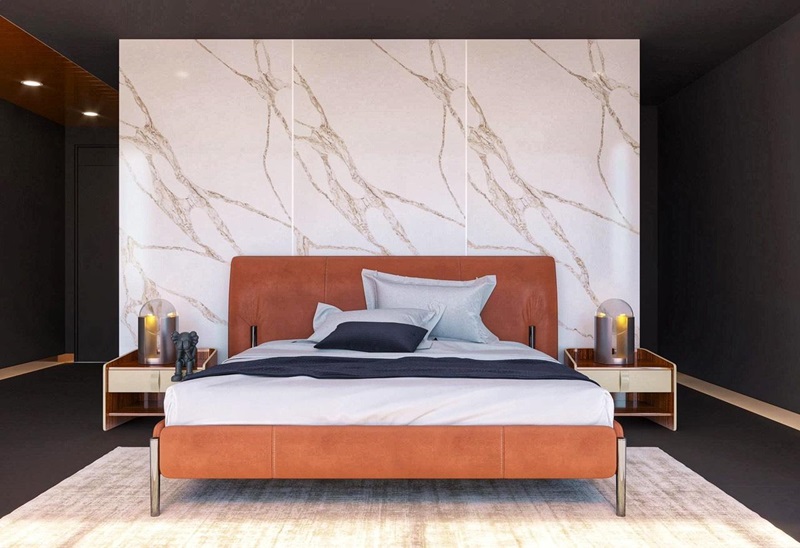 Mảng tường ốp đá VICOSTONE Vivalioro BQ8918 với những đường vân lớn lấy cảm hứng từ dòng magma chuyển động đầy nghệ thuật trở thành tâm điểm của không gian phòng ngủ hiện đại.