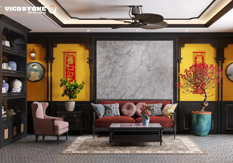Mảng tường ốp đá Bahia BQ8883 nổi bật giữa không gian, tạo điểm nhấn sang trọng và mạnh mẽ cho phòng khách phong cách Indochine.
