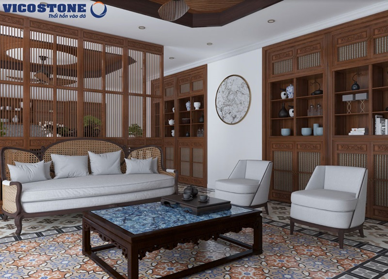 Không gian phòng khách nội thất phong cách indochine với chất liệu gỗ, mây tre và bàn ốp đá VICOSTONE Thunder Blue BQ8786 tạo điểm nhấn nổi bật và hài hòa với tổng thể kiến trúc.