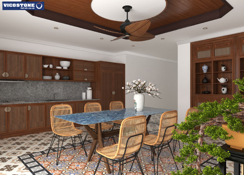 Bếp sử dụng bàn ăn ốp đá VICOSTONE Thunder Blue BQ8786 xanh lam kết hợp với ghế mây mang đến cho không gian bếp sự gần gũi 
