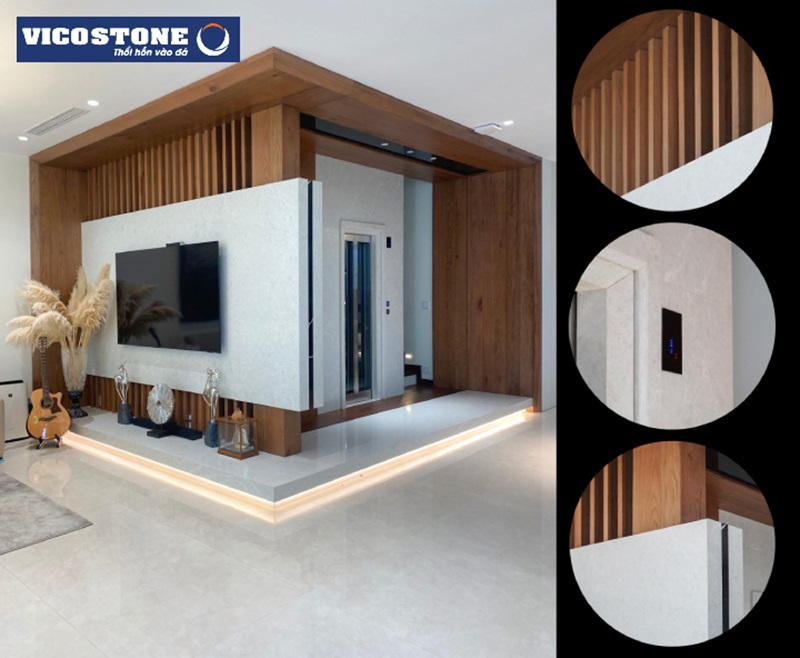 Biệt thự song lập tại dự án Vinhomes Marina thiết kế theo phong cách hiện đại tone màu ấm. Chất liệu sử dụng trong công trình là gỗ tự nhiên sồi kết hợp với đá VICOSTONE IceLake BQ8668 ốp tường thang máy
