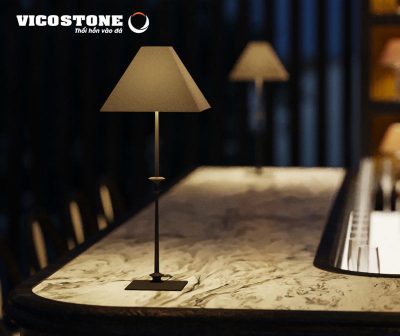 Cận cảnh mặt quầy bar ốp đá VICOSTONE White Fusion BQ8825 với những đường vân xám tự nhiên như những vòng xoáy mắt bão, tạo nên điểm nhấn nghệ thuật độc đáo cho không gian quầy bar phong cách Indochine (Nguồn: Tác phẩm Giao Thoa của KTS Nguyễn An Khương (Cuộc thi SOS 2021)